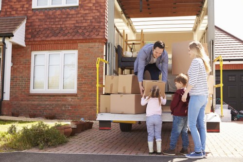 Packed boxes and furniture inside a moving truck in Islington