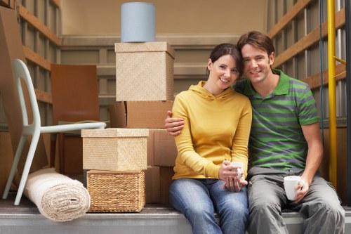Professional movers loading furniture in Islington