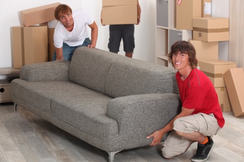Packed boxes and furniture ready for a local home removal