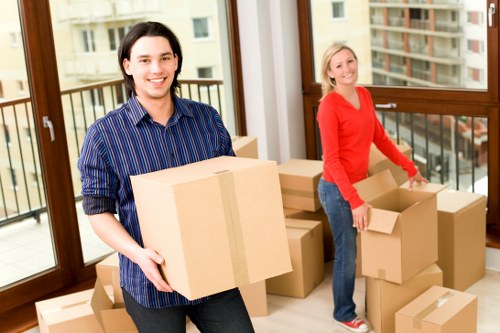 Commercial man and van moving equipment in Islington
